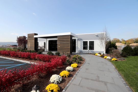 The sales office for Edge-on-Hudson, photographed Oct. 23, 2018, a new residential development planned for the site of the former General Motors assembly plant in Sleepy Hollow, has been completed and is set to open. Toll Brothers, the company developing the site, has begun construction of townhomes. Infrastructure work, the planting of grass, as well as pile driving for foundations is under way.